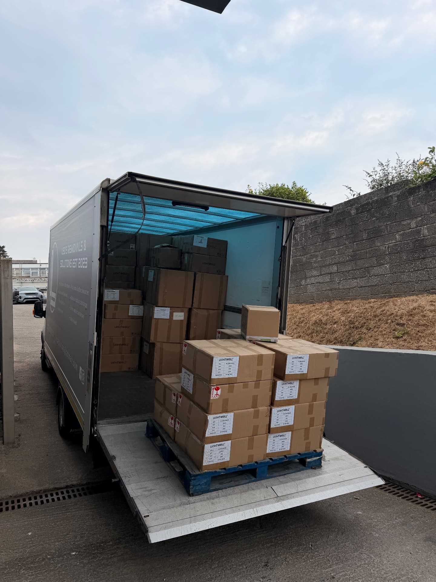Truck loaded with pallets of packed cardboard boxes